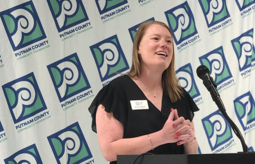 PCCF Executive Director Neysa Meyer speaking at event